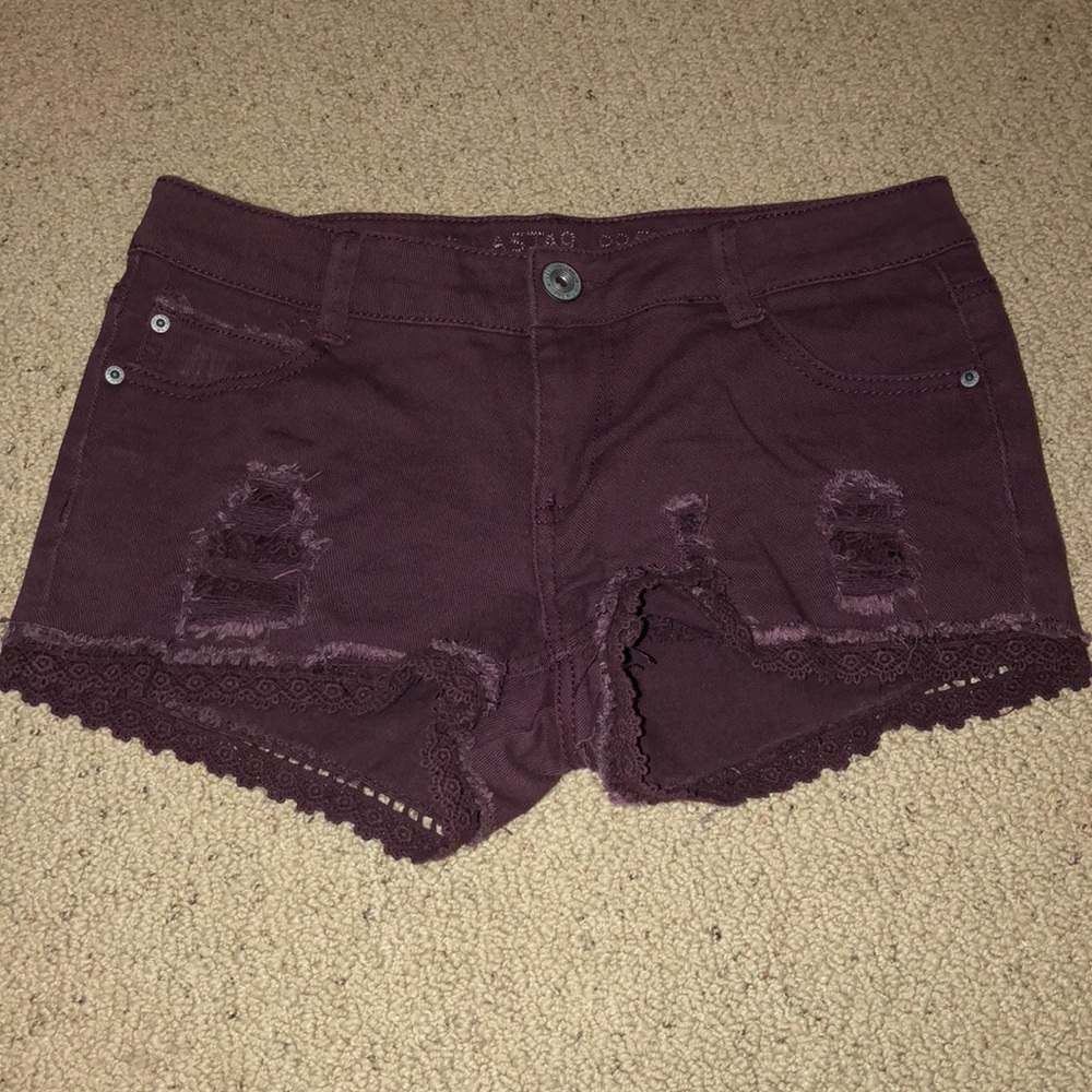 Maroon shorts.
